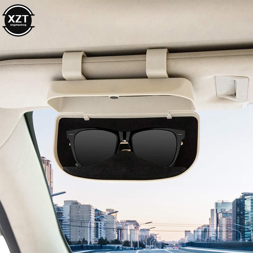 https://robaizkine.com/wp-content/uploads/2023/02/Universal-Car-Glasses-Case-Sunglass-Storage-Box-Sun-Visor-Clip-on-Glasses-Storage-Box-Car-Interior.jpg